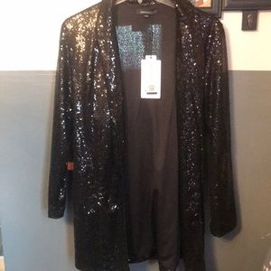 Black sequins jacket brand new size large run small